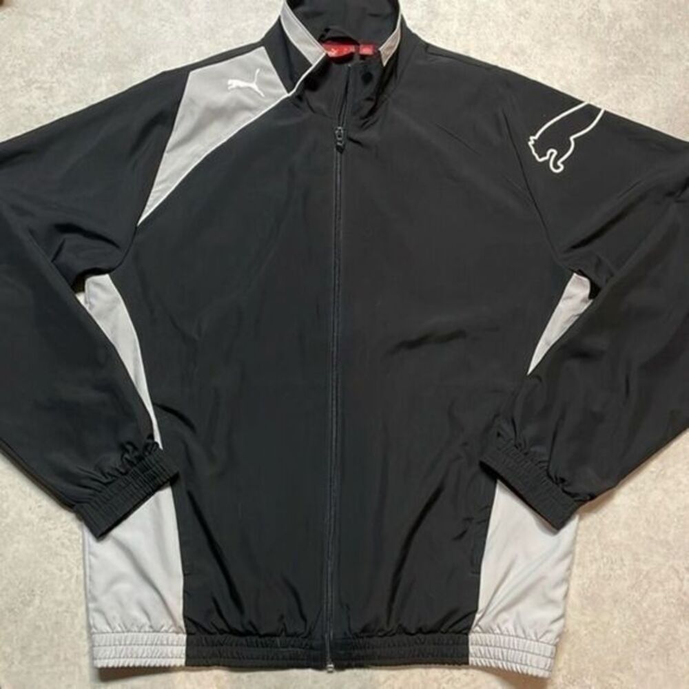 Puma Men’s full zip black/gray windbreaker. Size M.